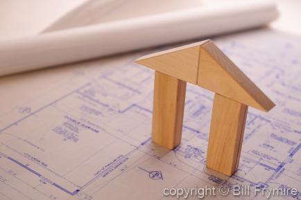 House blueprints with wooden block house